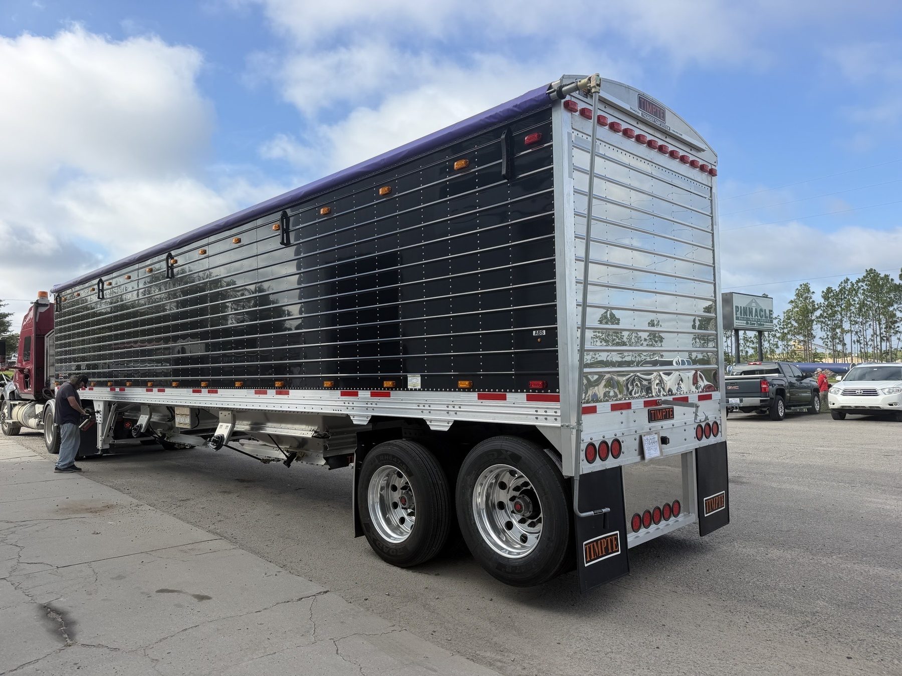 Black and polished aluminum Timpte hopper trailer